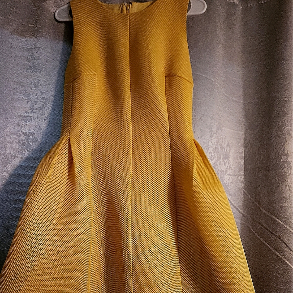 Bright yellow Calvin Klein dress